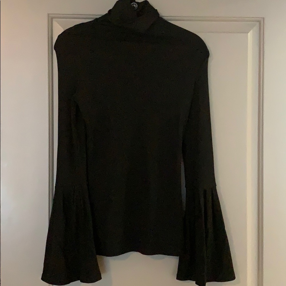 Black turtleneck with bell sleeves